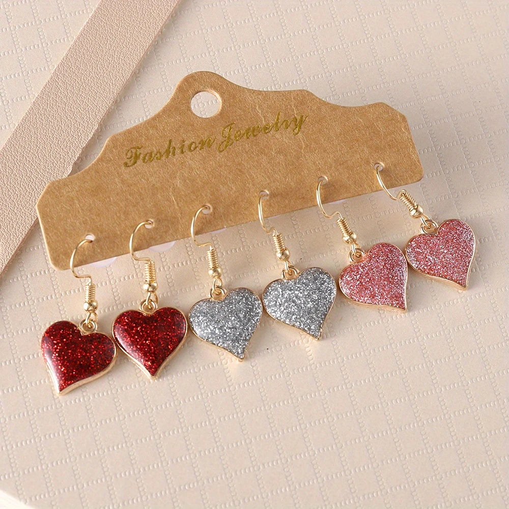 3 Pair of Wholesale Sparkle Glitter Heart Dangle Earrings – Trendy and Eye-Catching Jewelry